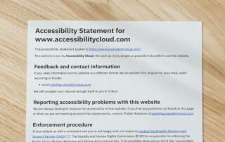 Graphic showing a piece of paper with an accessibility statement printed on it